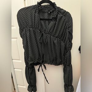 Black polkadot tie blouse